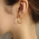 Simple hoop pierce