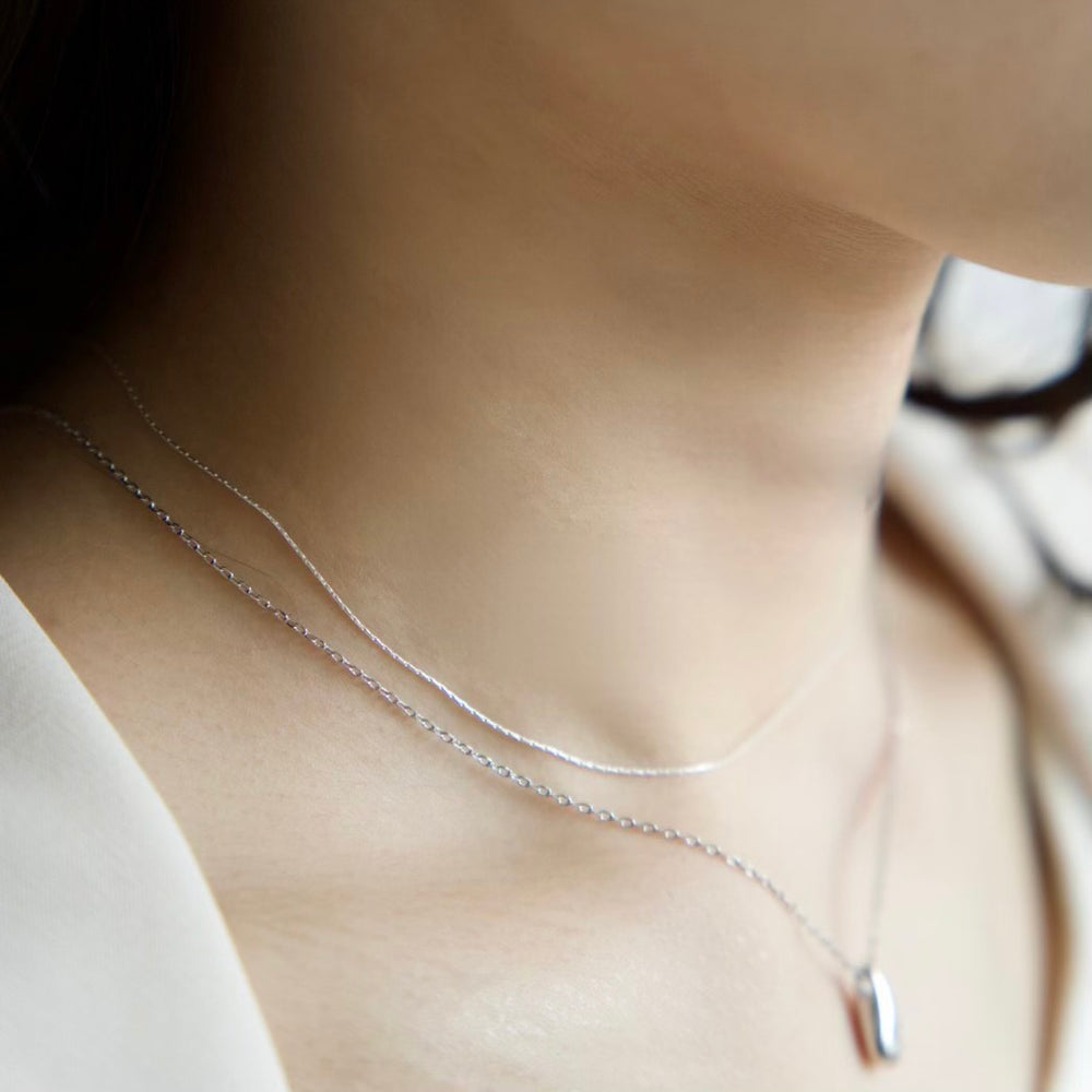 LARMES NECKLACE SILVER – RUMÉL